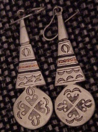 Pierced style dangling earrings made by the Tuareg people.